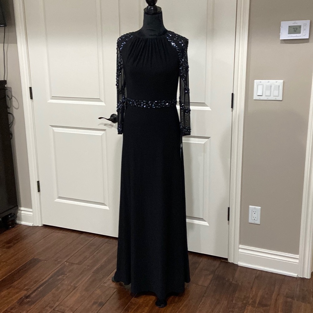 NWT size 4 MARINA FORMAL DRESS. JERSEY MATERIAL WITH MESH BEADED LONG SLEEVES